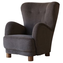 A High Back Arm Chair, Upholstered in Pure Alpaca Wool