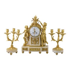 Louis XVI clock garrison and chandeliers. POCHON. Paris, circa late 18th century