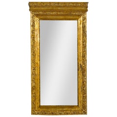 Miroir Trumeau colonial néerlandais vintage en bois doré avec motifs sculptés en volutes