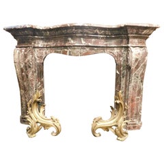 Fireplace mantle in "Rosso Levanto" marble, carved in volutes, Genoa Italy