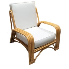 Restored 4-Strand Staple Arm Rattan Lounge Chair by Paul Laszlo