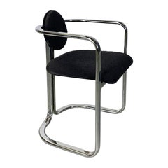 Vintage Italian modern chromed steel and black cotton rounded shapes tub chair, 1970s