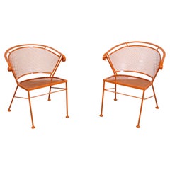 Pair of Mid-Century Modern Atomic Orange Outdoor Metal Curved Back Chairs