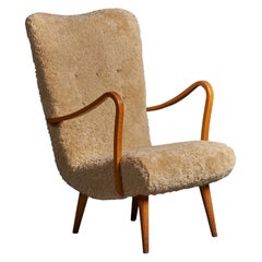 Retro Carl Gustaf Hiort Af Ornäs Attribution Lounge Chair Wood Shearling Finland 1950s