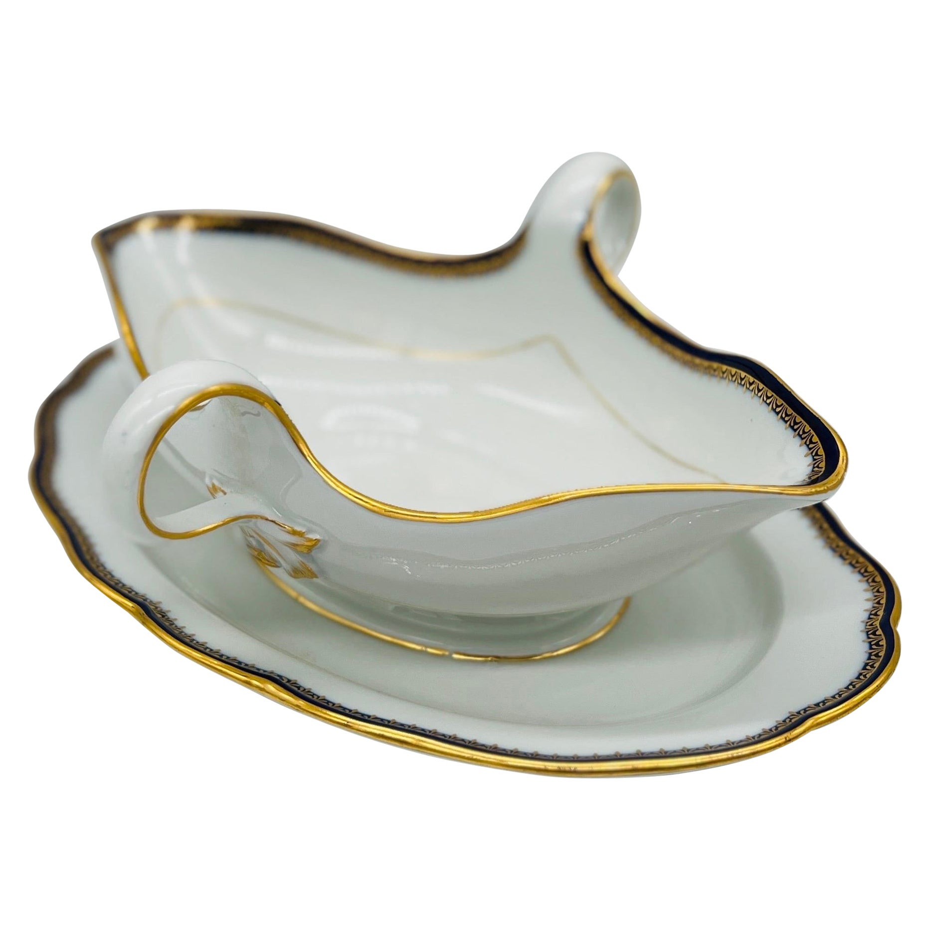 Salsera de porcelana de Meissen decorada con borde cobalto y oro