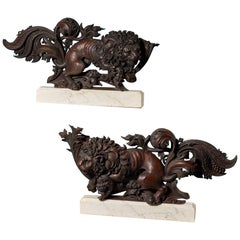 Two Mounted Antique Carved Wooden Lion Sculptures