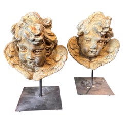 Two Italians 1920s Baroque style Stone Head of Angels on Iron Pedestals