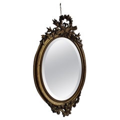 Antique Golden oval mirror