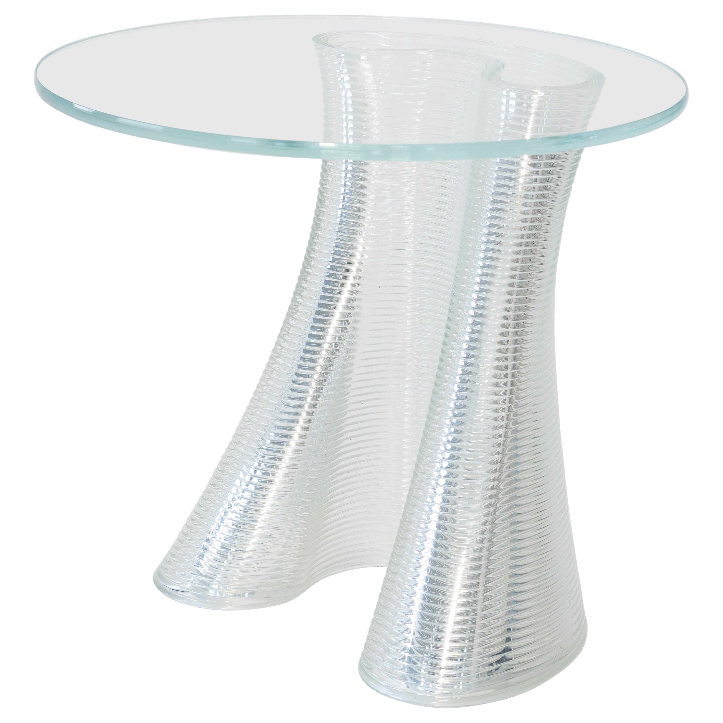 Made using Evenline's one-of-a-kind molten glass 3D printer, Drape is a low side table perfect for living next to your favorite lounge chair or couch. Inspired by the draping form of a fine hanging fabric, there is a surreal nature such a soft form