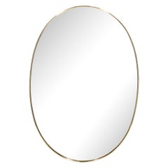 Mid-Century Modernist Oval Polished Brass Wrapped Mirror 