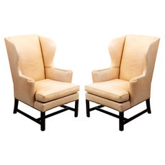 Pair of Cowtan and Tout Camel Leather Wing Chairs