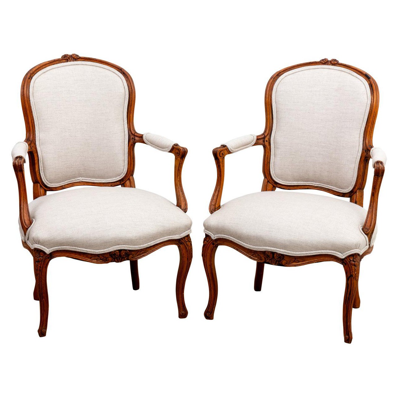 Pair of Louis XV style fruitwood armchairs