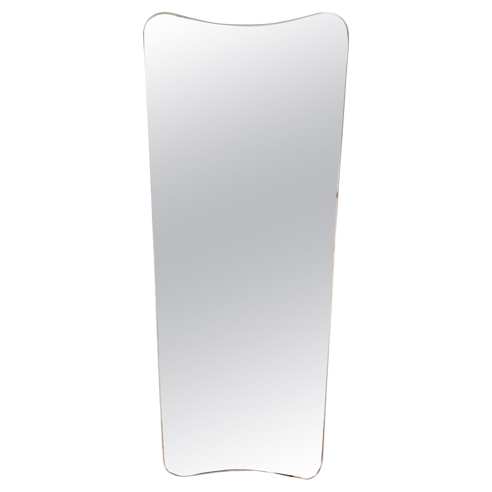Italian brass framed mirror in the manner of Gio Ponti. Contemporary