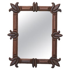 French Tramp Art Turn of the Century Mirror with Carved Floral Accentuation