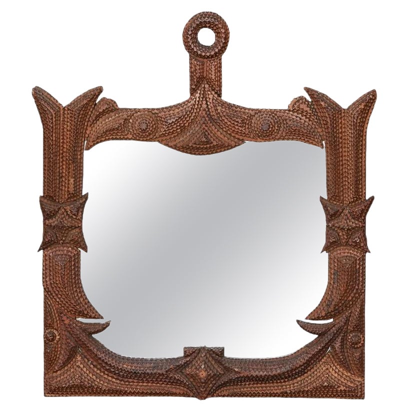 French Turn of the Century Carved Tramp Art Mirror with Unusual Shape For Sale