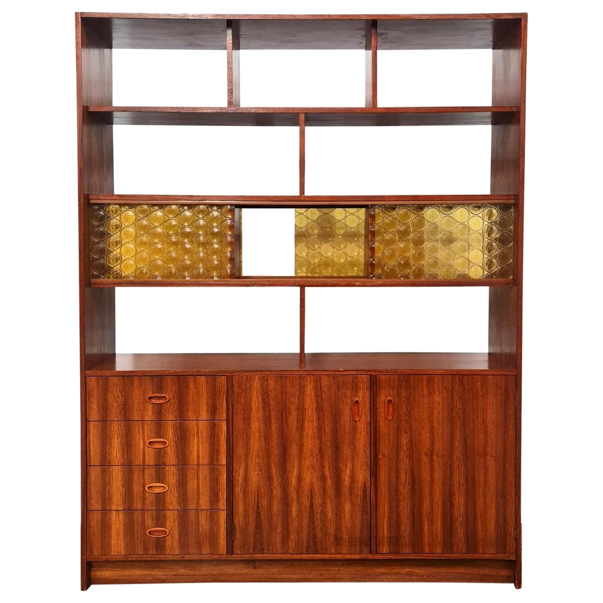 Early 1970's Bookshelf / Room Divider apparently built by an architect for their own house. 

Both sides are exactly the same with drawers, glass sliding doors and wooden doors along the bottom.

A few small nicks around the corners that have been