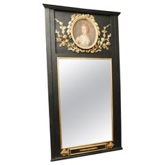 Antique Big Mirror black lacquered wood, gilded carvings and painting dame, Italy