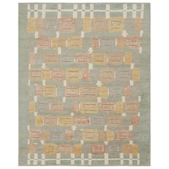 Diseño de alfombra a medida de estilo escandinavo de Rug & Kilim con motivos geométricos azules