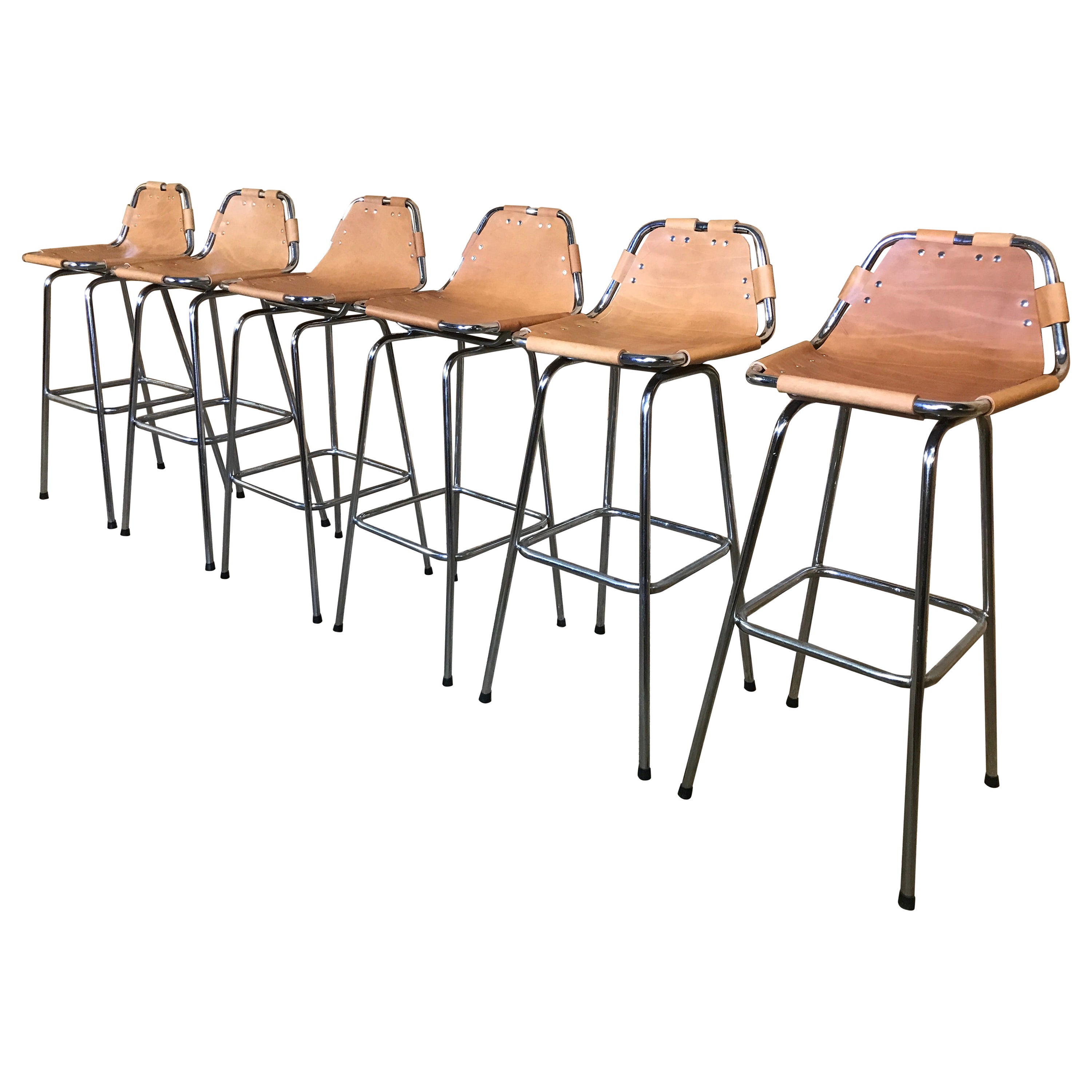 Vintage cognac colour Leather Stools Selected by Charlotte Perriand for Les Arcs For Sale