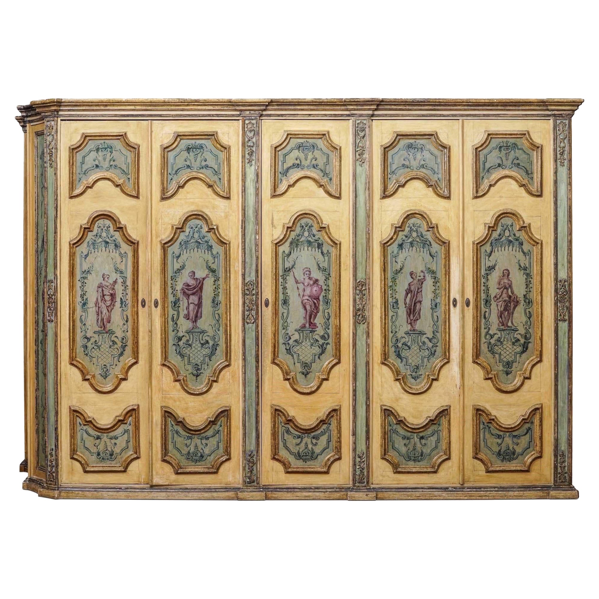 18th Century Neapolitan Armoire, carved and gilded framing neoclassical figures 