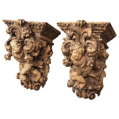 Antique Pair of Highly Carved Partially Stripped French Oak Cherub Brackets, C. 1850