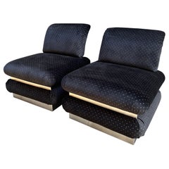 Coppia di poltroncine rivestite in velluto nero con puntini in lurex, Años 70