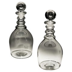 A Pair Of Plain George Iii Three Ring Decanters