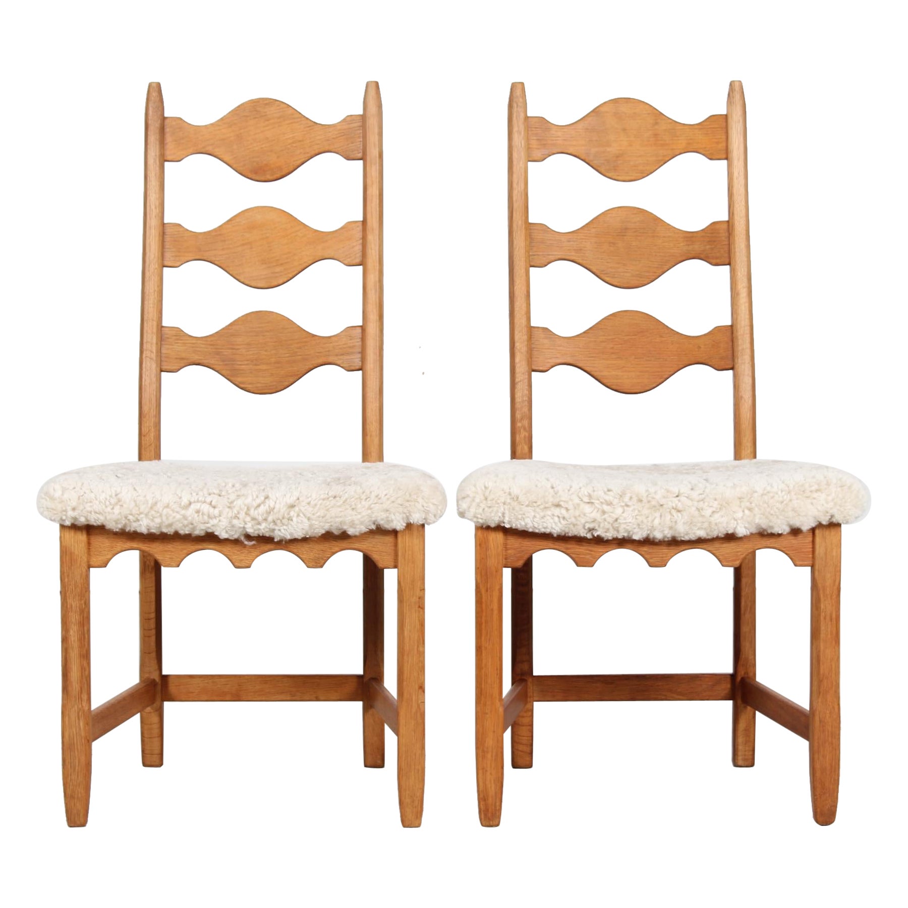Set of 2 Danish Henning Kjærnulf Chairs of Solid Oak with Sheepskin, 1970s