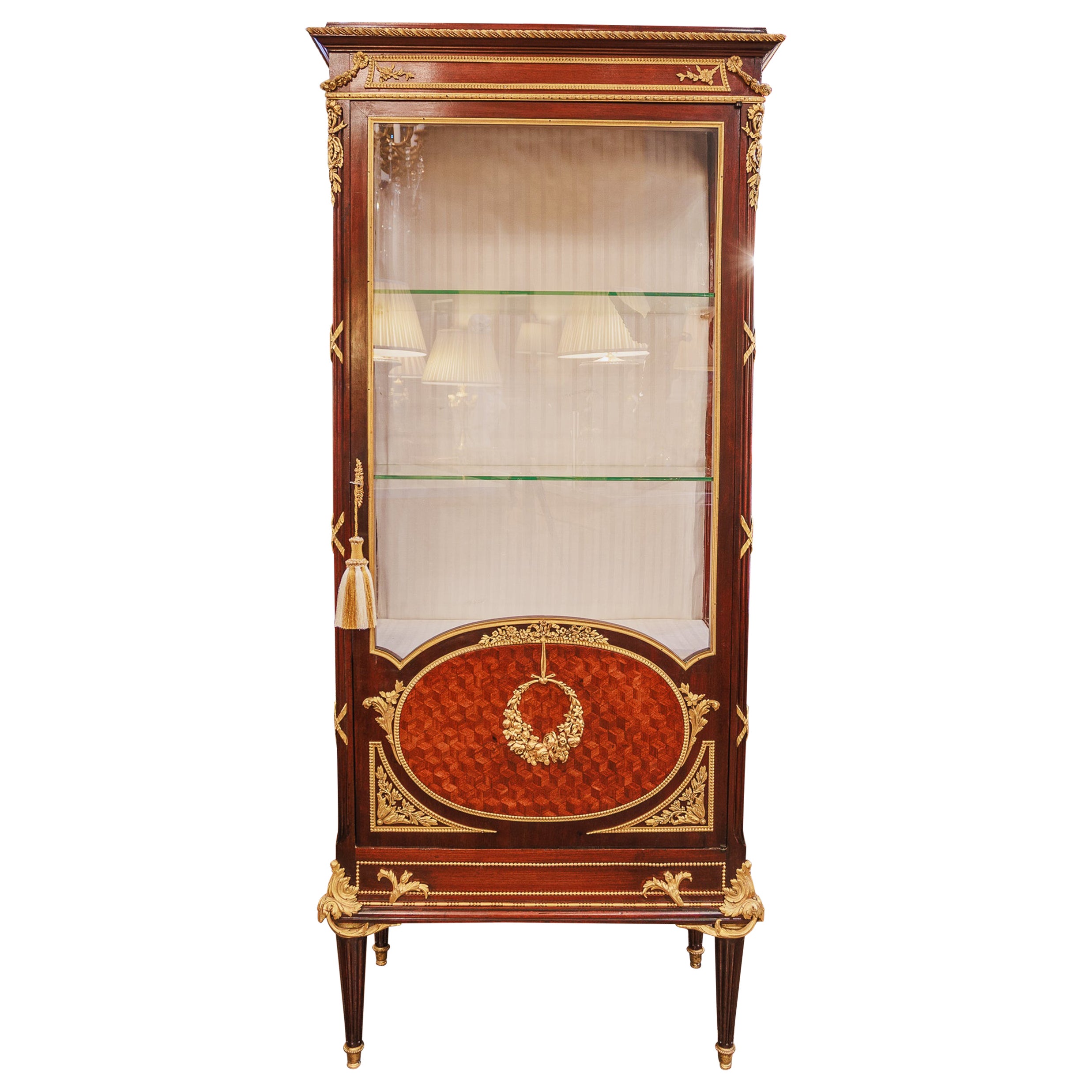 A fine 19th century French Louis XVI kingwood parquetry and gilt bronze vitrine 