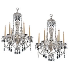 A Pair Of Silvered and Crystal Chandeliers By Osler & Faraday 