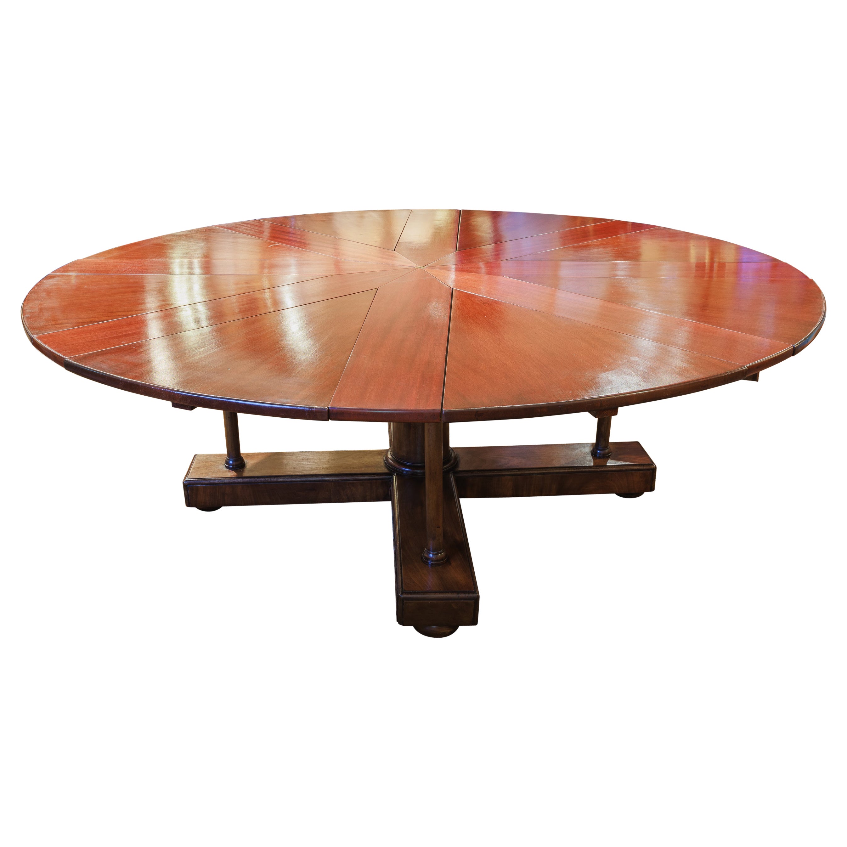 A rare 19thc early Victorian mahogany  "Jupe" circular extending dining table