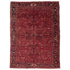 Tapis Heriz rouge rouille ancien avec motif sur toute sa surface