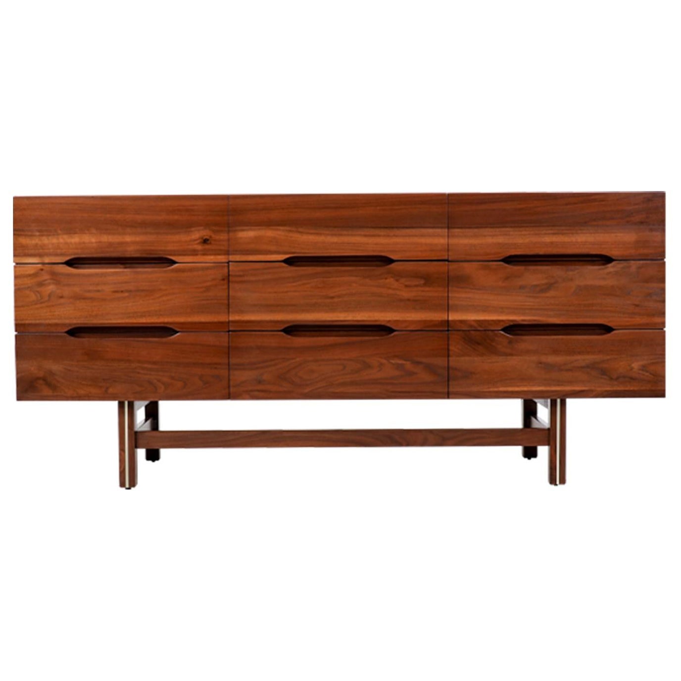Mid-Century Modern Sculpted Walnut 9-Drawer Dresser with Brass Accent  For Sale