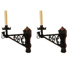 Pair of Wrought Iron Sconces on Wooden Backplate