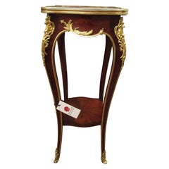 Antique A beautiful 19th  French  side table . Mahogany and gilt bronze mounts by Durand