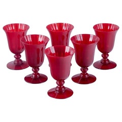 Vintage A set of six large wine glasses in red glass. Sweden.