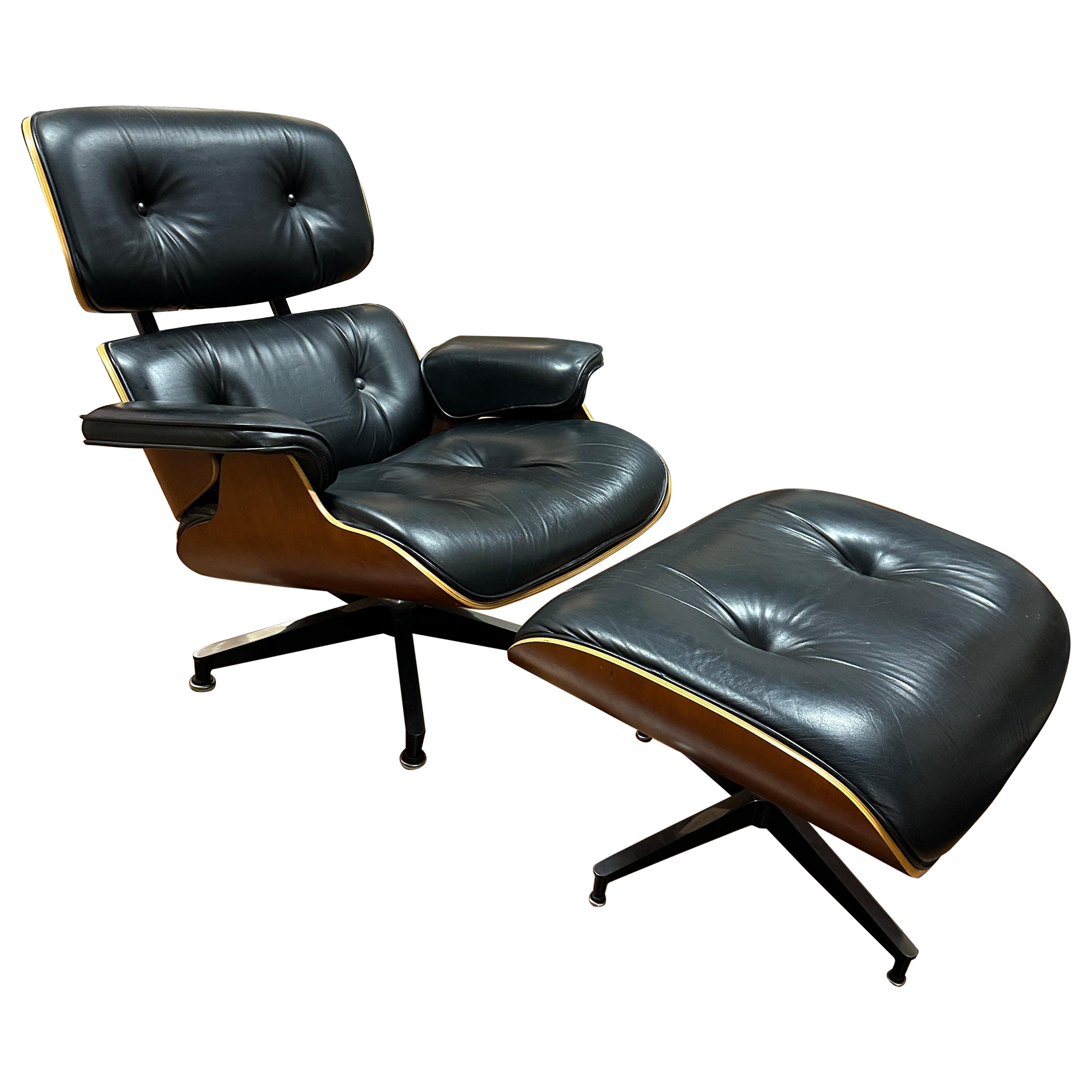 Herman Miller Eames Chair and Ottoman in Cherry Wood
