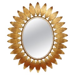 Vintage Spanish Gilt Metal Sunburst Mirror with Leaf Motif (circa 1970s)