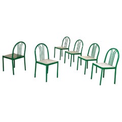Used Italian modern green tubular metal and grey straw stackable chairs, 1980s