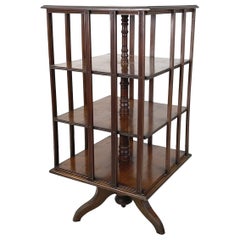 English antique Revolving bookcase in solid wood, 1920s