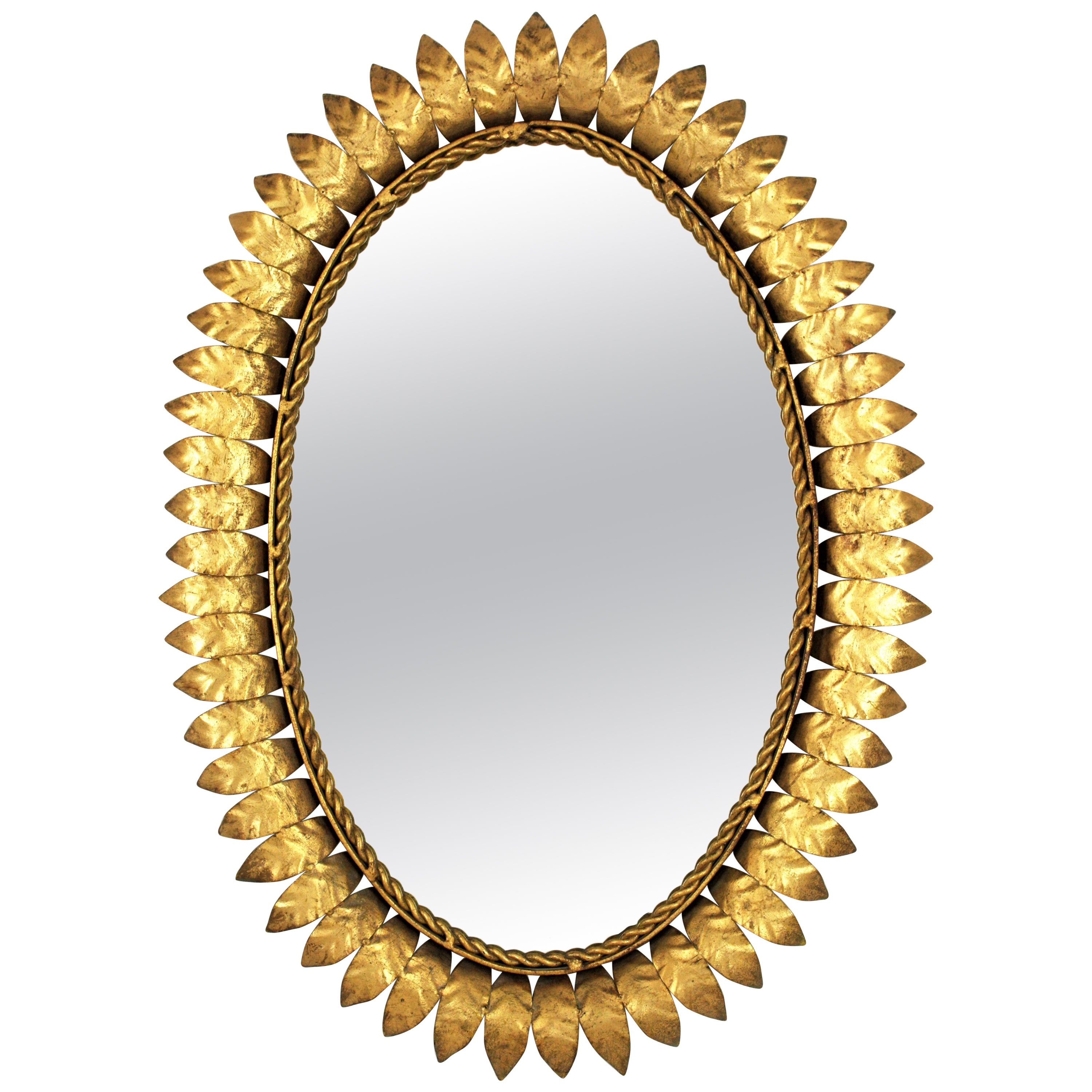 1950s Sunburst Oval Mirror in Gilt Metal For Sale