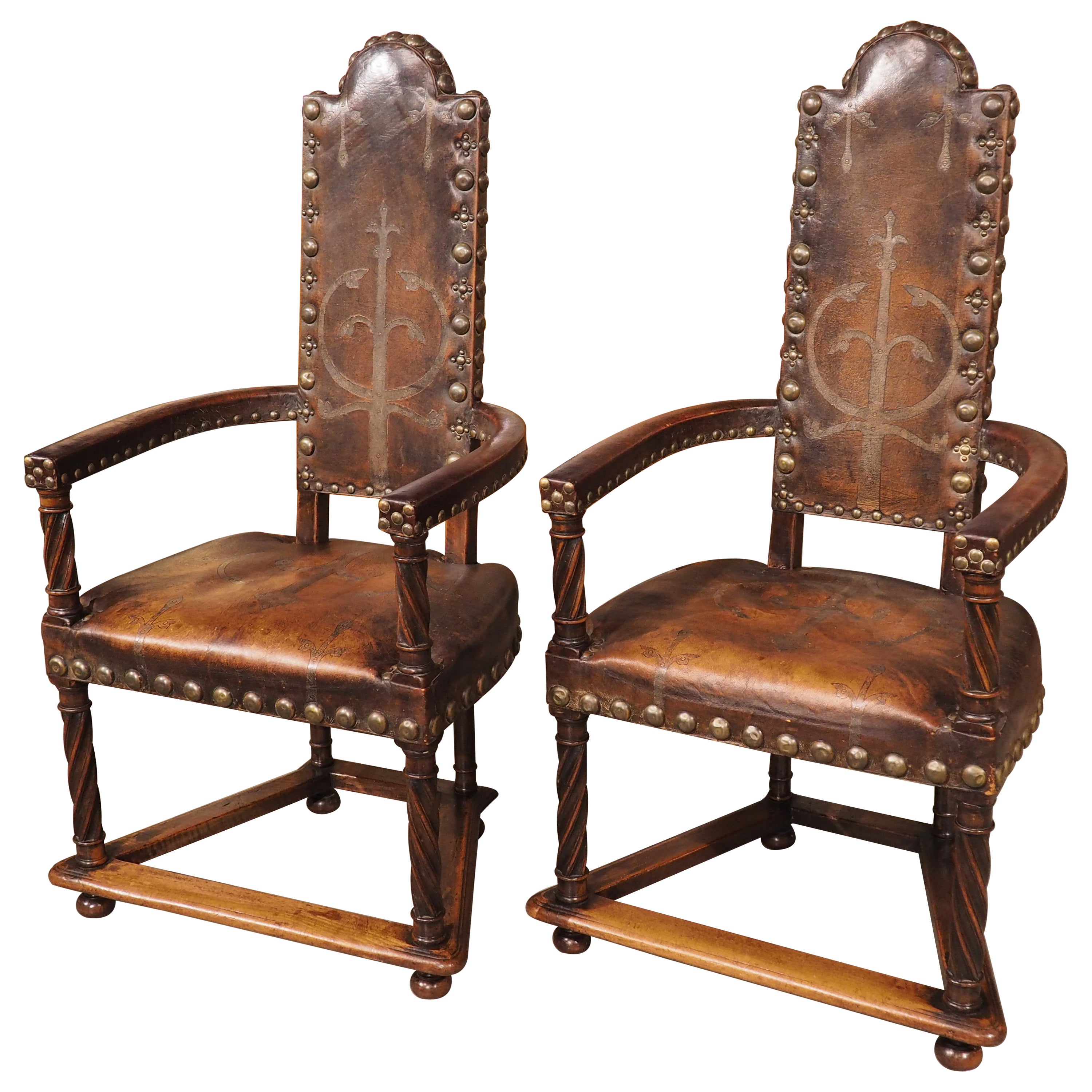 A Unique Pair of 19th Century Studded Leather Armchairs from Spain