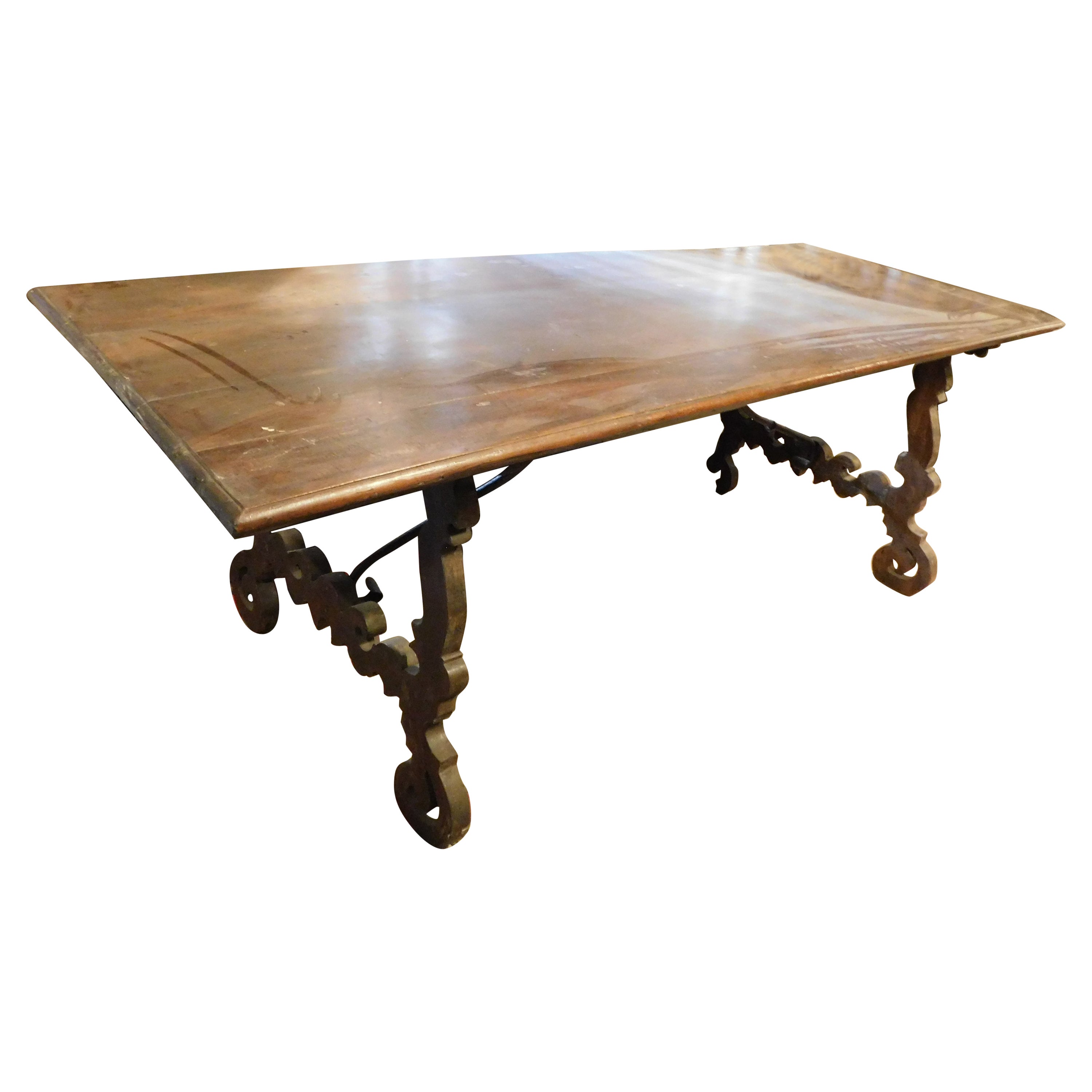old Fratino table in walnut, wavy legs, Italy