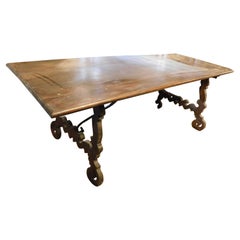 old Fratino table in walnut, wavy legs, Italy