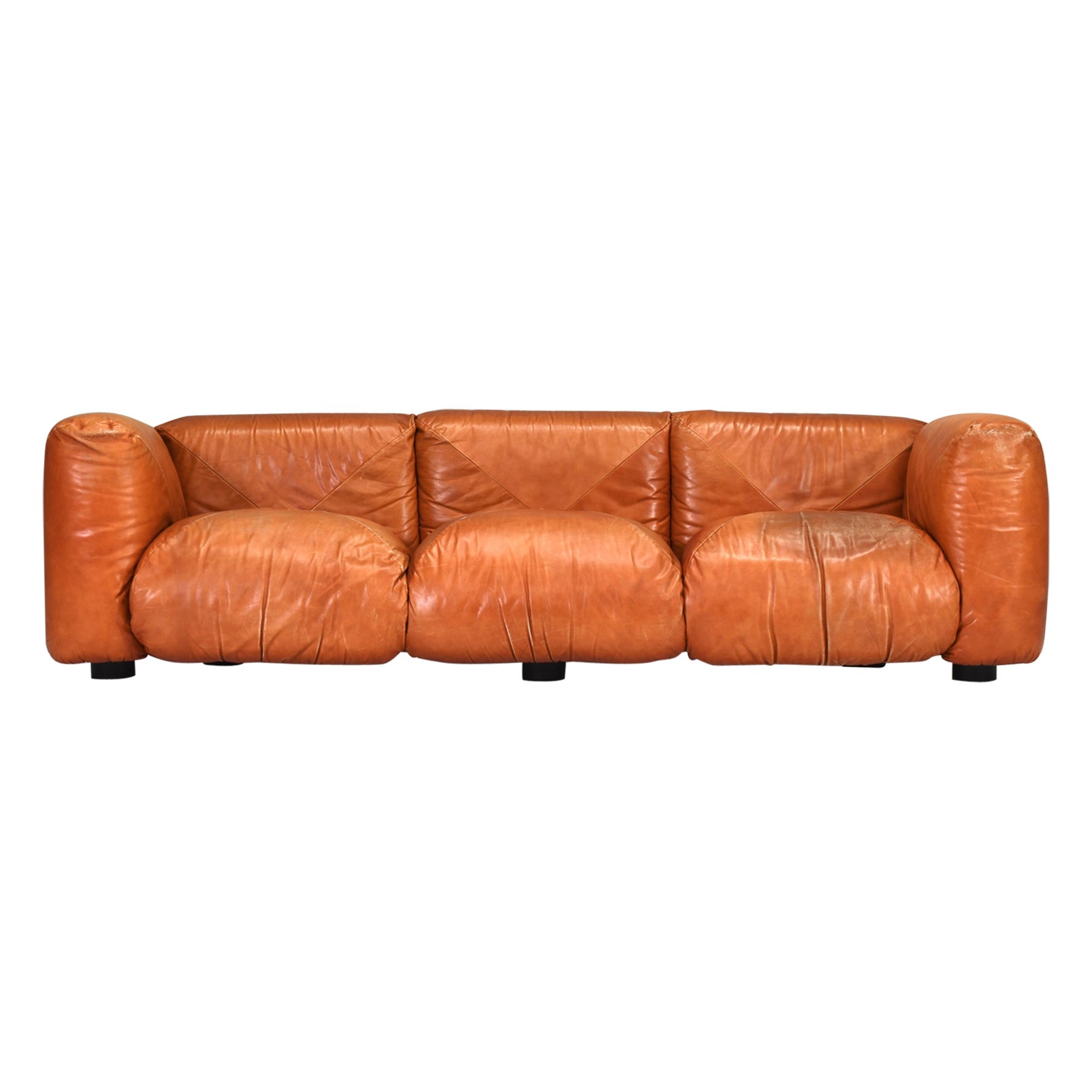 The Marius&Marius lounge chairs and sofa were designed by the Italian architect and designer Mario Marenco in 1970. He is known for distinctive and innovative designs, featuring large, plush cushions that appear to float on a lightweight, flexible