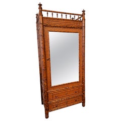 Vintage British Colonial Style Burnt Bamboo and Cane Armoire