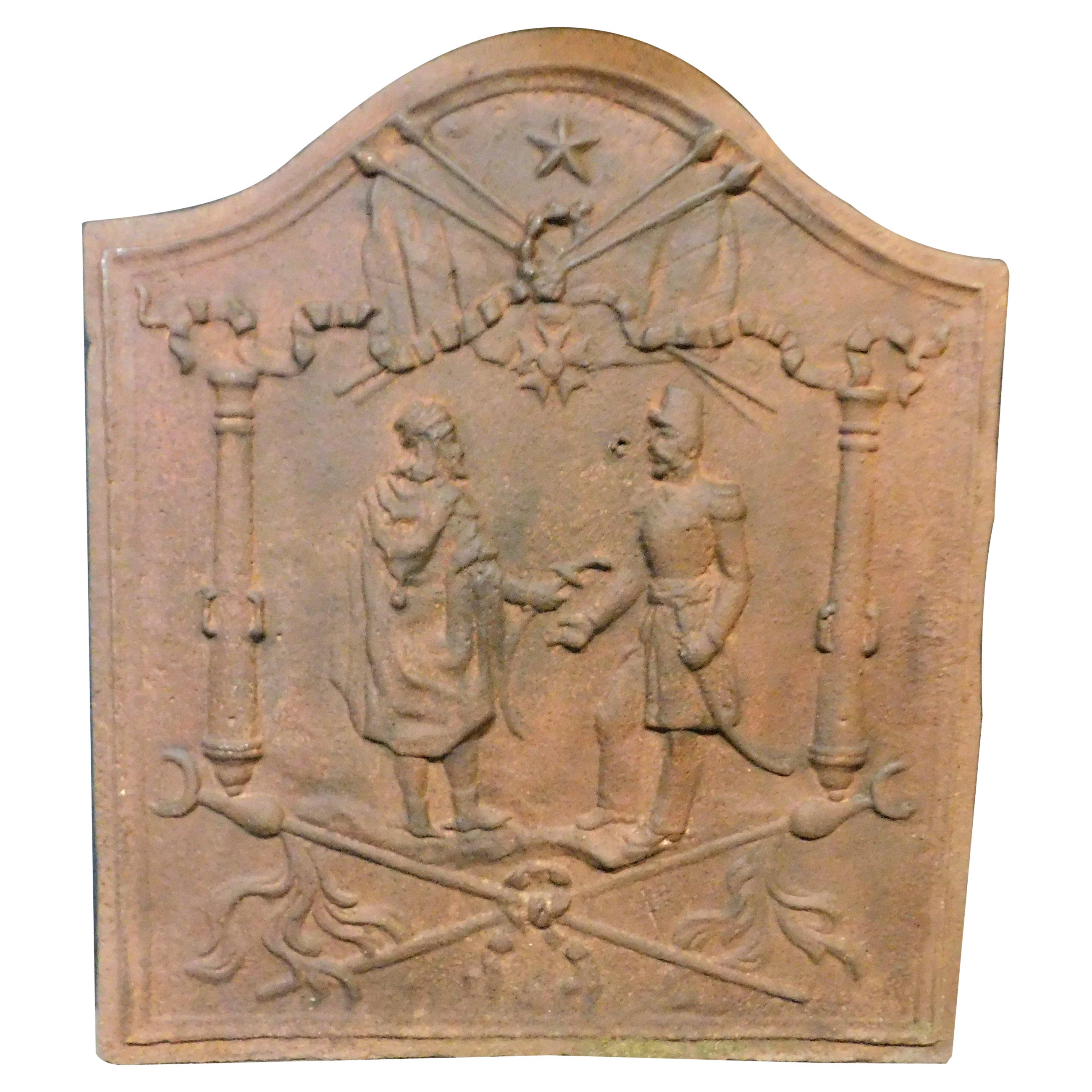 Cast iron fireplace back plate, richly carved with human figures, 19th century For Sale