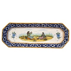Beau plat en faïence de Porquier peint du 19ème siècle signé IB Quimper