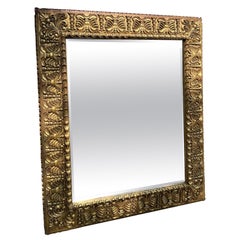 Miroir italien doré avec motif de feuillage