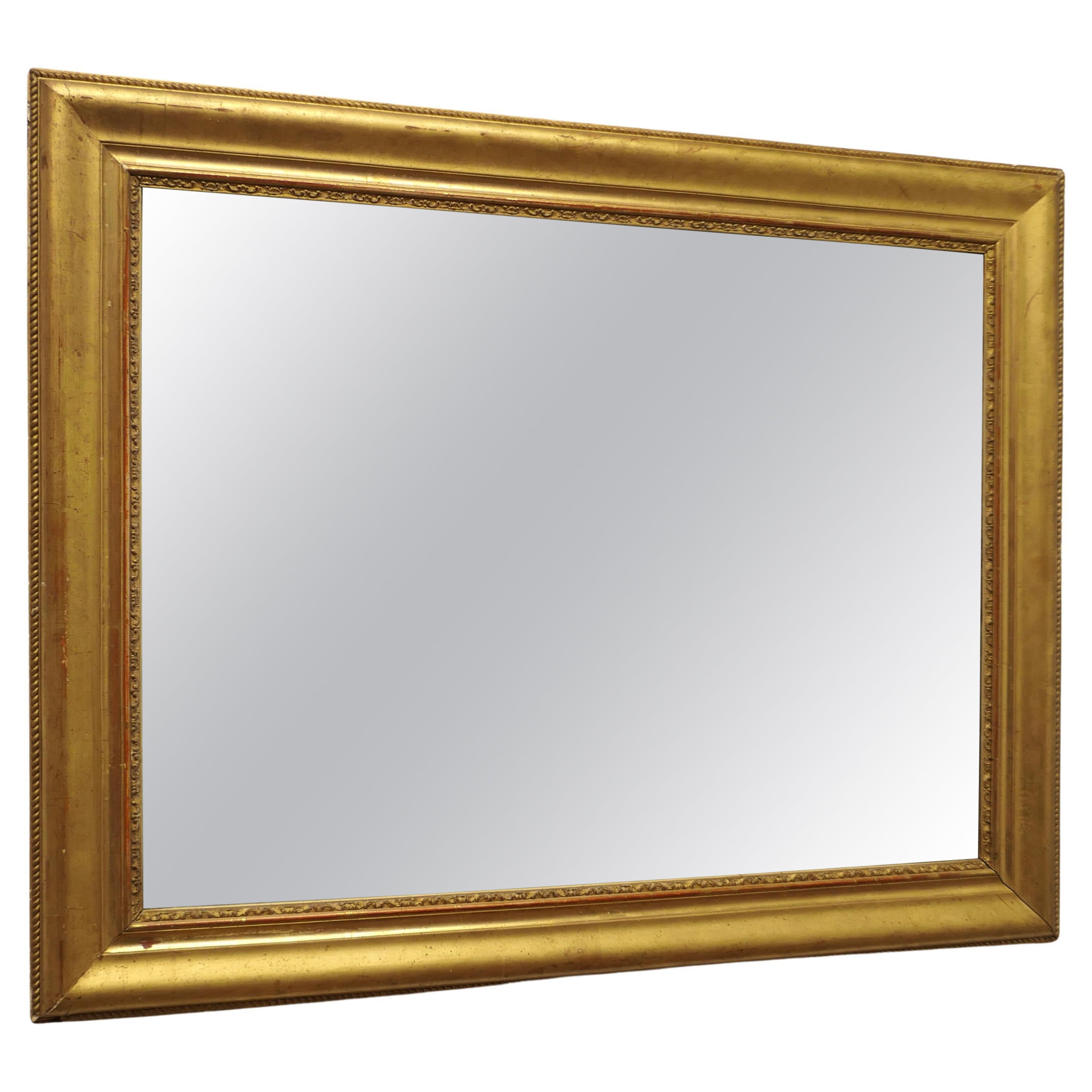 Ancien miroir rectangulaire doré   